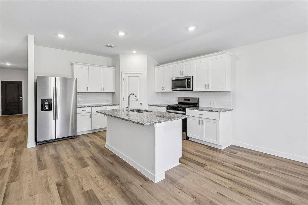 1757 Onion Creek Place, Crandall, TX 75114 Photo is not of the actual home, but is an inspirational photo of builder’s model home and may depict options, furnishings, and/or decorator features that are not included.