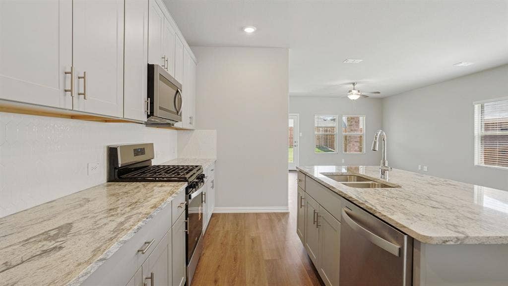 1733 Gardendale Hollow Lane, Anna, TX 75409 Photo is not of the actual home, but is an inspirational photo of builder’s model home and may depict options, furnishings, and/or decorator features that are not included.