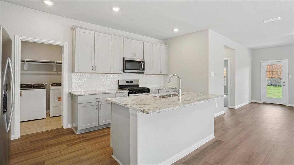 1733 Gardendale Hollow Lane, Anna, TX 75409 Photo is not of the actual home, but is an inspirational photo of builder’s model home and may depict options, furnishings, and/or decorator features that are not included.