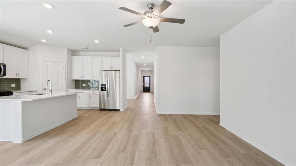 1204 Morrell Drive, Princeton, TX 75071 Photo is not of the actual home, but is an inspirational photo of builder’s model home and may depict options, furnishings, and/or decorator features that are not included.