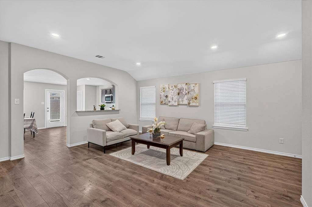 2428 Rosharon Drive, Forney, TX 75126 Wood-finish flooring throughout, recessed lighting, and arched doorways