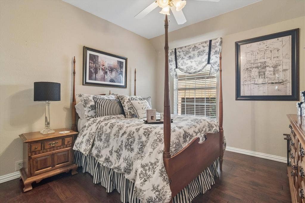 10521 Chablis Lane, Frisco, TX 75035 Wood-finish flooring, ceiling fan with integrated lighting, window with blinds, and white trim