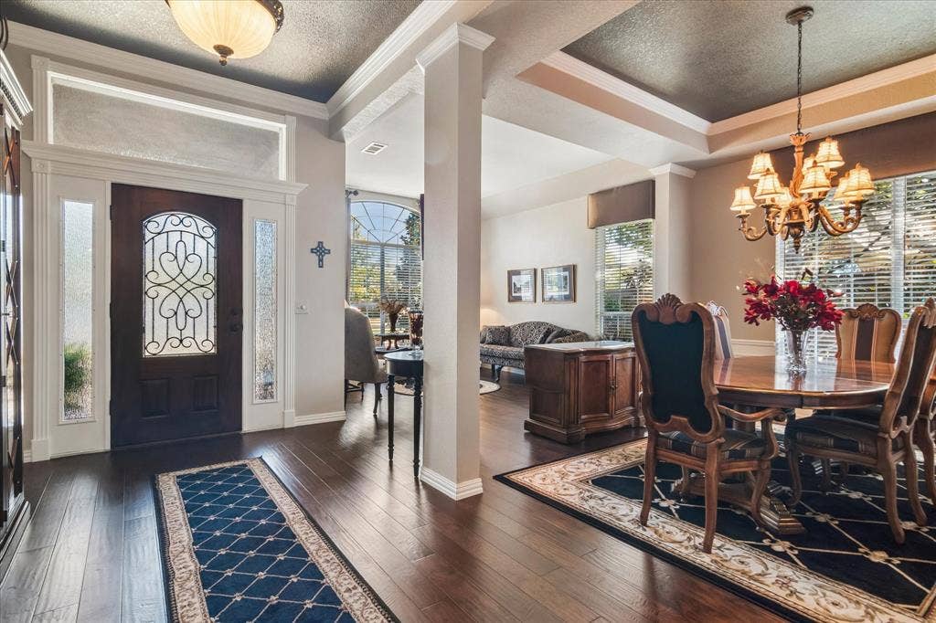 10521 Chablis Lane, Frisco, TX 75035 Dark wood-finish flooring throughout