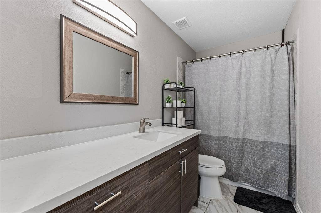 128 E Johnson Street, Hewitt, TX 76643 bathroom downstairs