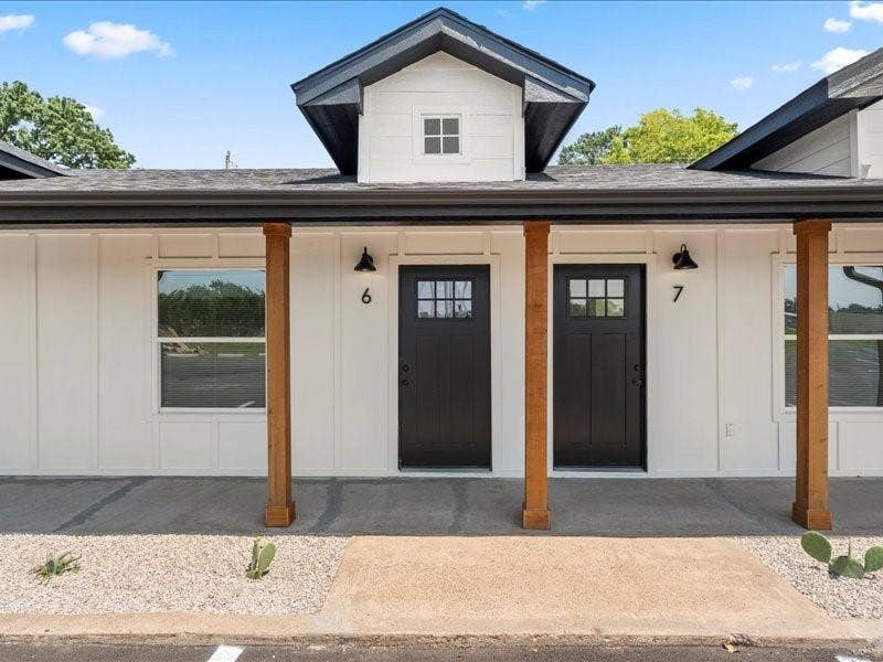 900 S Tool, #12, Tool, TX 75143 White vertical siding exterior with black trim