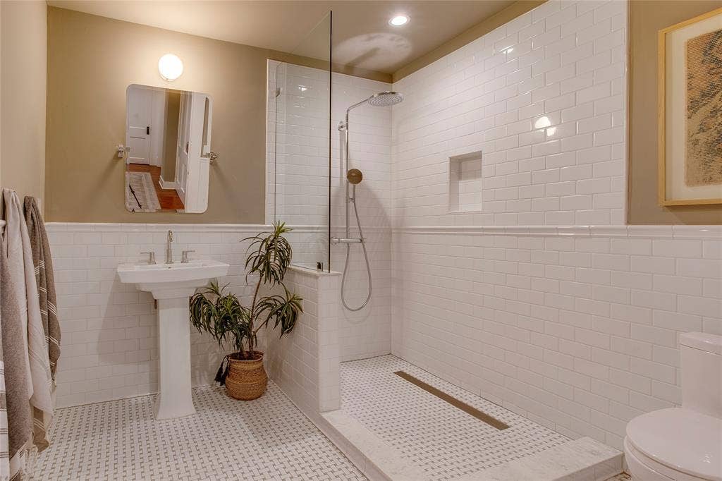 Full downstairs bath with tiled walk-in shower