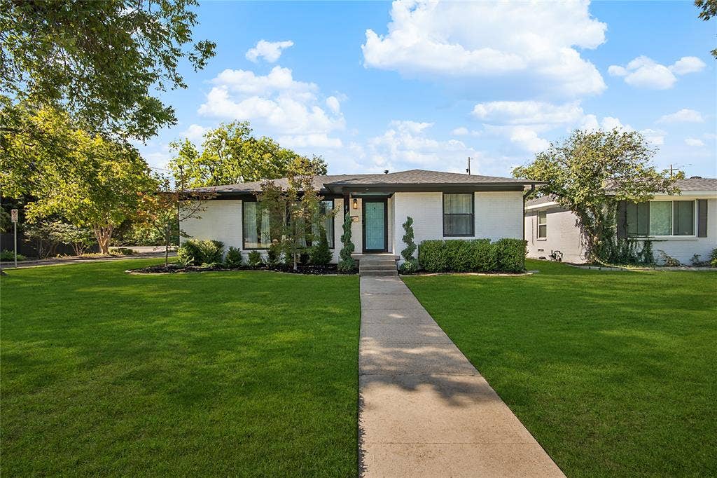 2144 Springhill Drive, Dallas, TX 75228 Grass has been digitally enhanced.