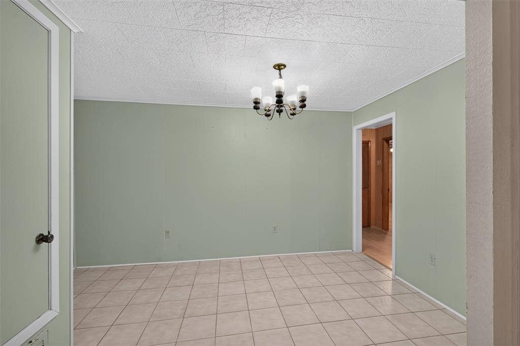 9468 Ranch Lane, Shreveport, LA 71106 Neutral-toned ceramic tile flooring with a grid pattern