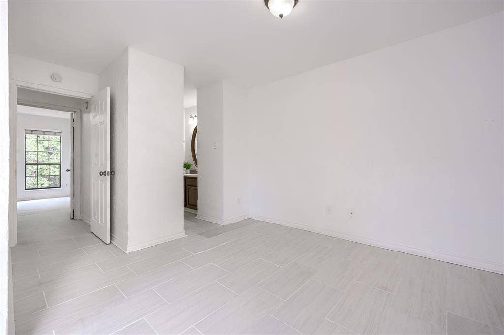 1600 Brentwood Drive, Irving, TX 75061 Light-toned tile flooring throughout