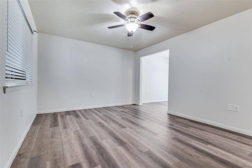 428 N Dallas Avenue, #3, Lancaster, TX 75146 White walls and wood-finish flooring