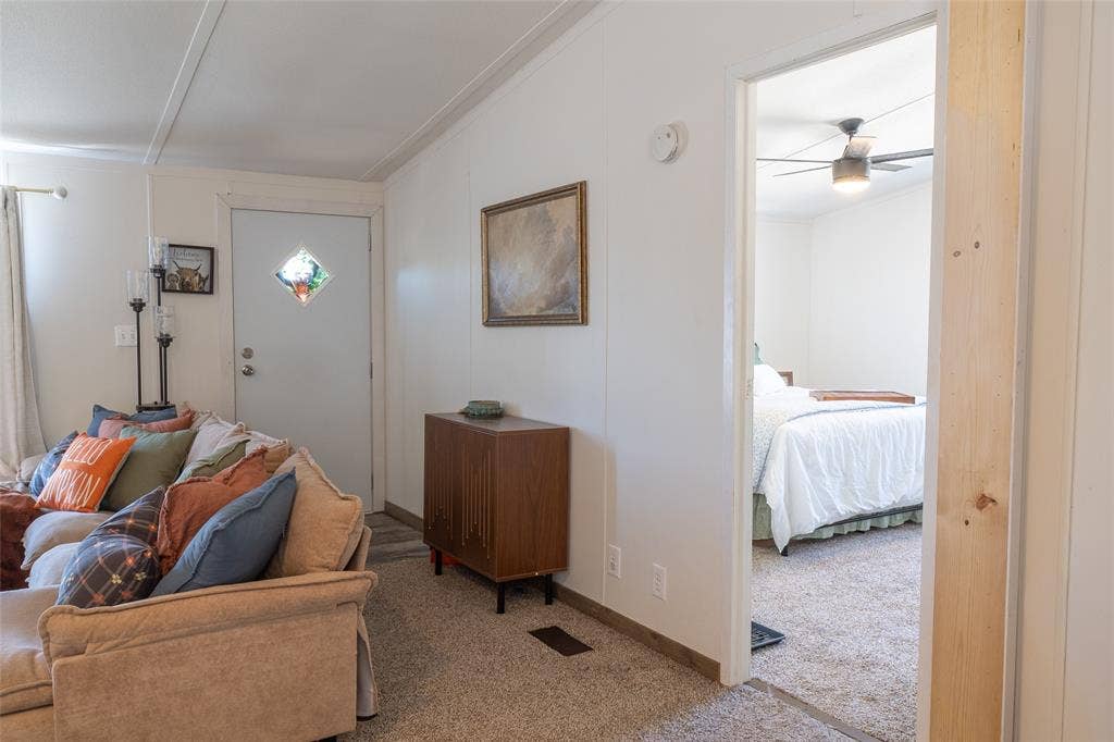 Living Room leads to Primary Bedroom