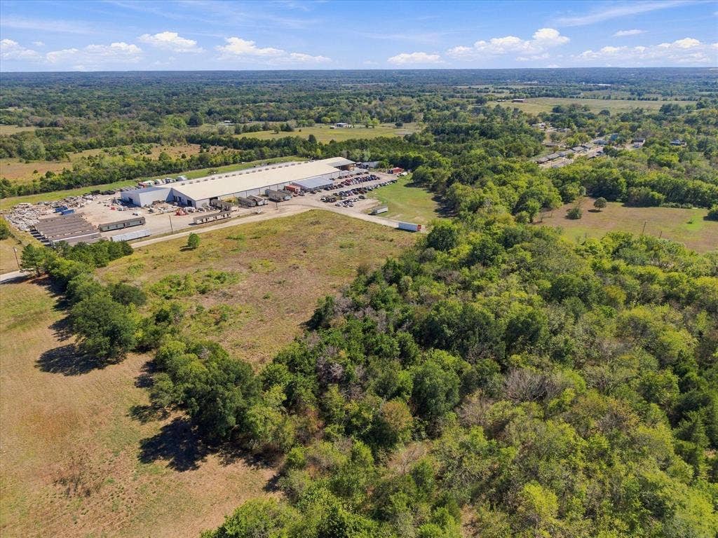 TBD N Neal Street, Commerce, TX 75428 Great opportunity to own stunning 7 plus acres of tree lined land in university town.