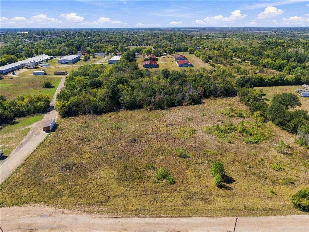 TBD N Neal Street, Commerce, TX 75428 Tree lined acreage provides privacy for your home or rental properties!