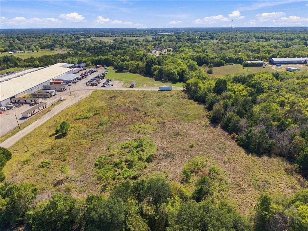 TBD N Neal Street, Commerce, TX 75428 Lovely tree lined acreage ready for your project!