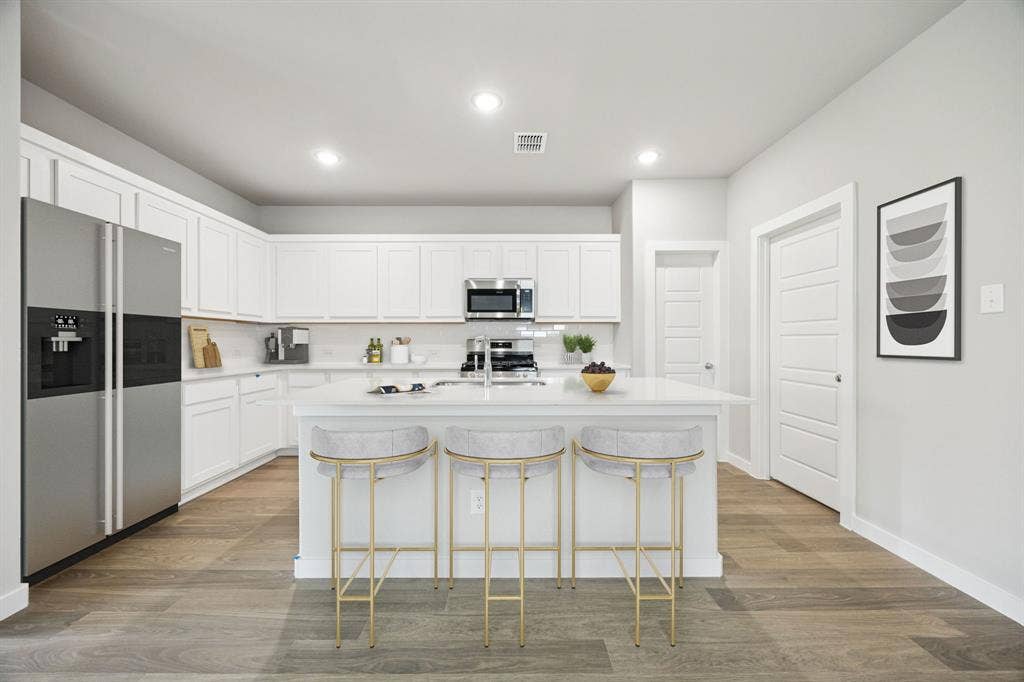 1121 Sundog Drive, Princeton, TX 75407 Kitchen in the Hayden home plan – REPRESENTATIVE PHOTO