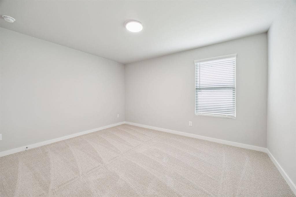 1121 Sundog Drive, Princeton, TX 75407 Bedroom in the Hayden home plan – REPRESENTATIVE PHOTO