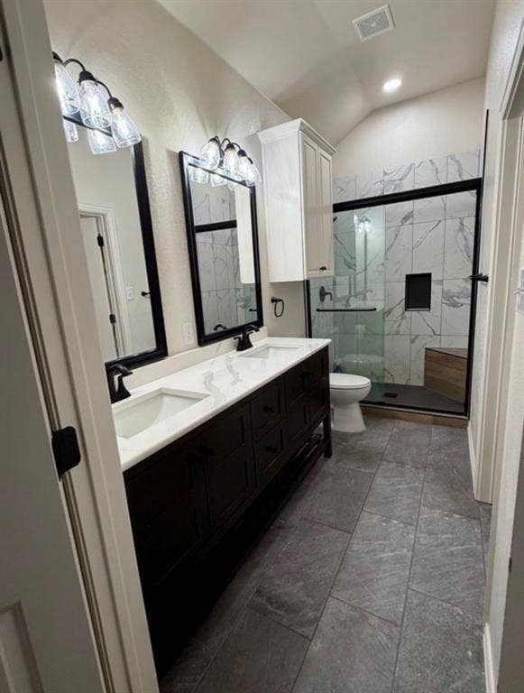 1001 Roberts Bend, Granbury, TX 76048 Dual vanity with white undermount sinks, matte black faucets, and a white countertop
