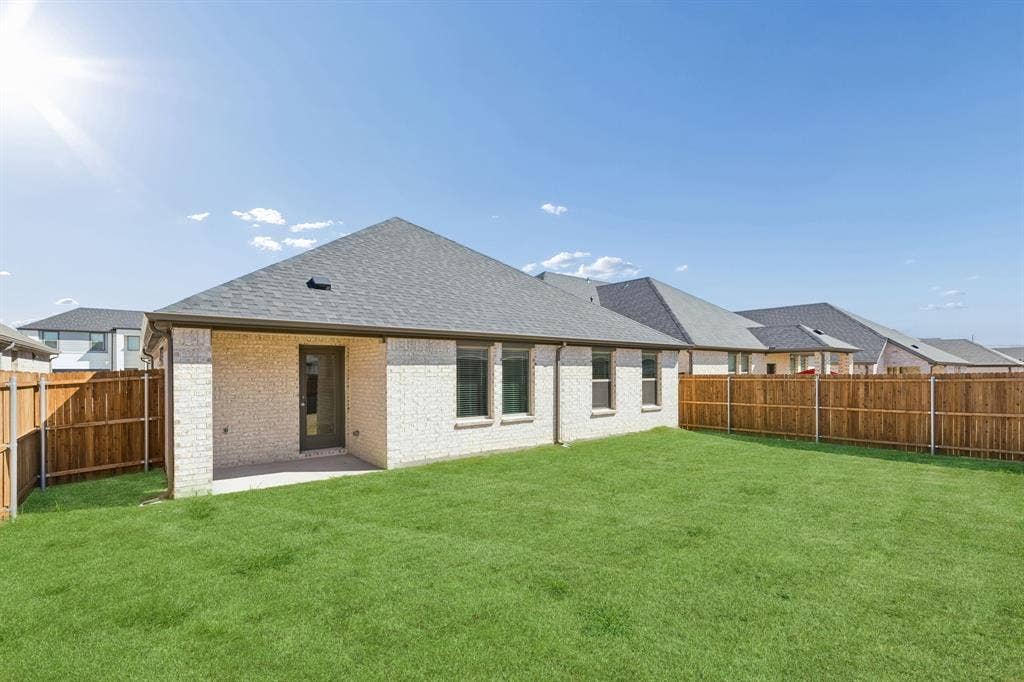 2304 Warm Glow Way, Princeton, TX 75407 Covered Patio in the Harrison home plan – REPRESENTATIVE PHOTO