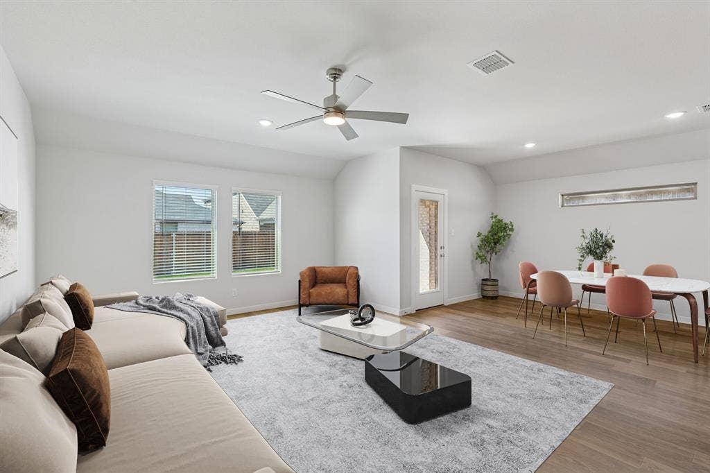 2304 Warm Glow Way, Princeton, TX 75407 Living Room in the Harrison home plan – REPRESENTATIVE PHOTO