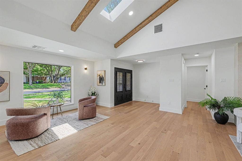 4004 Cedar Bayou Drive, Dallas, TX 75244 Vaulted ceiling with exposed wood beams, skylight, and recessed lighting