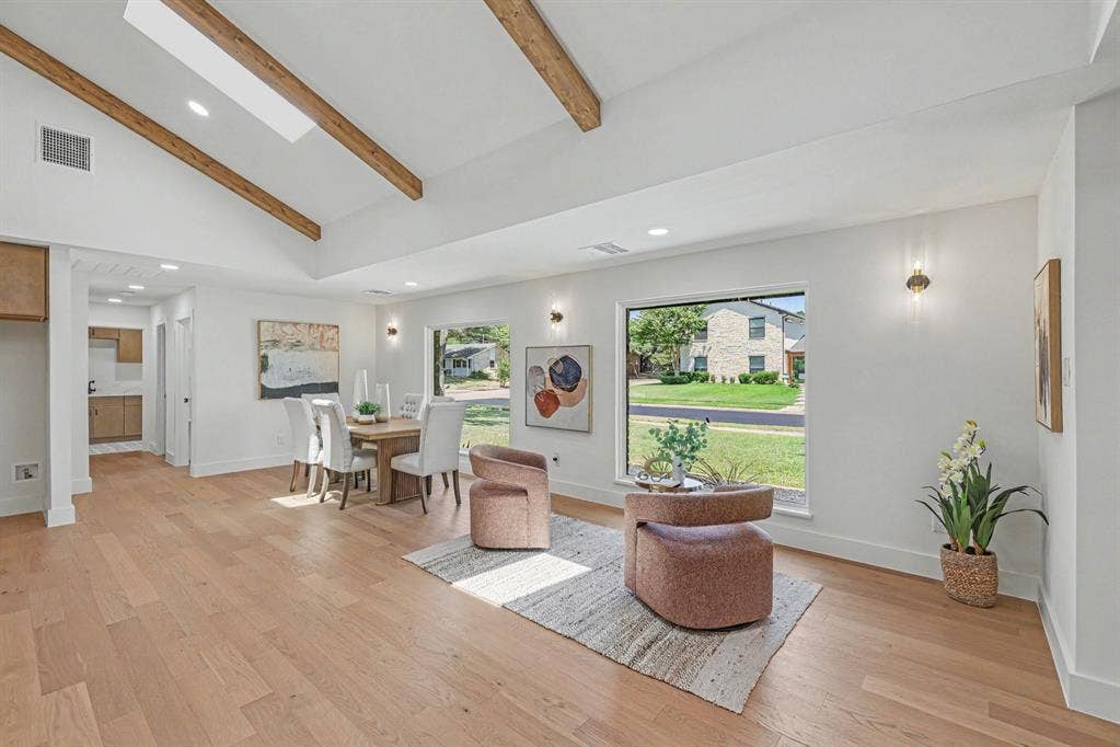 4004 Cedar Bayou Drive, Dallas, TX 75244 Vaulted ceiling with exposed wood beams, skylight, wood-finish flooring, and recessed lighting
