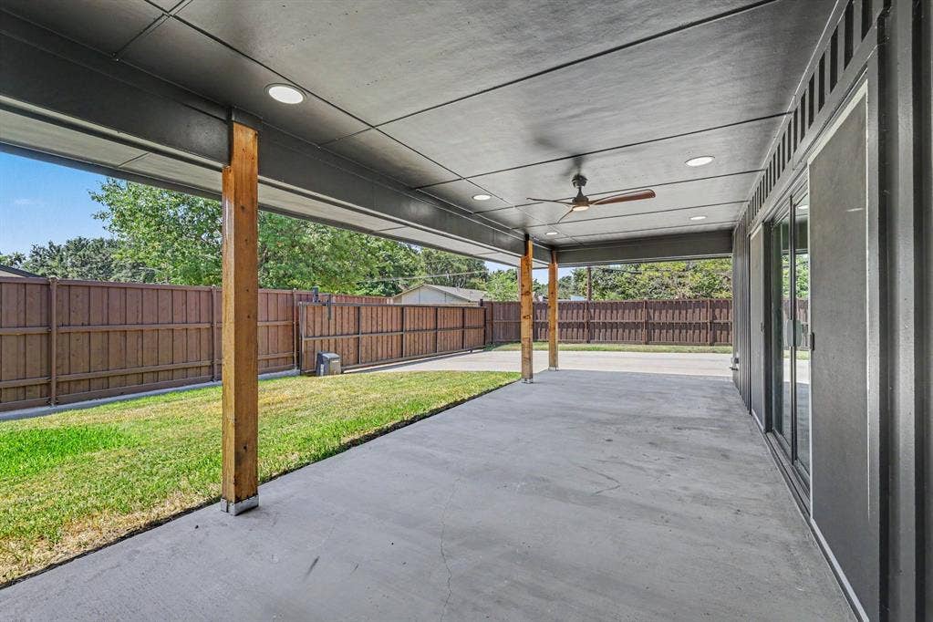 4004 Cedar Bayou Drive, Dallas, TX 75244 Expansive covered patio featuring a ceiling fan, recessed lighting, concrete flooring, and wood posts