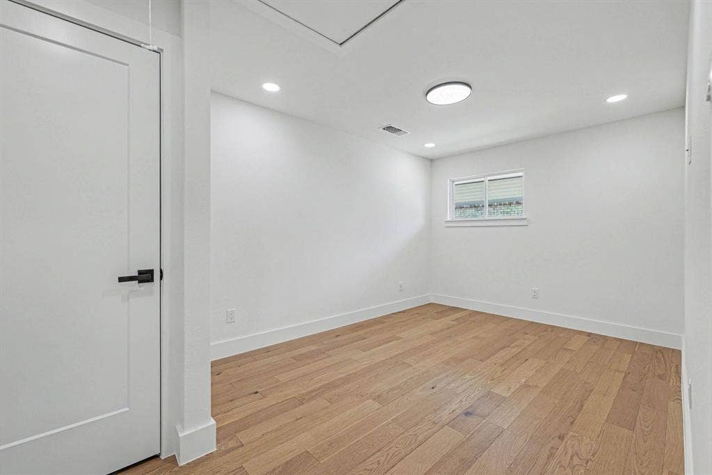 4004 Cedar Bayou Drive, Dallas, TX 75244 Wood-finish flooring, recessed lighting, and a window with blinds