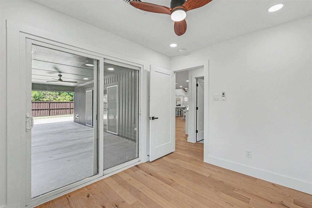 4004 Cedar Bayou Drive, Dallas, TX 75244 Wood-finish flooring, recessed lighting, and a modern ceiling fan