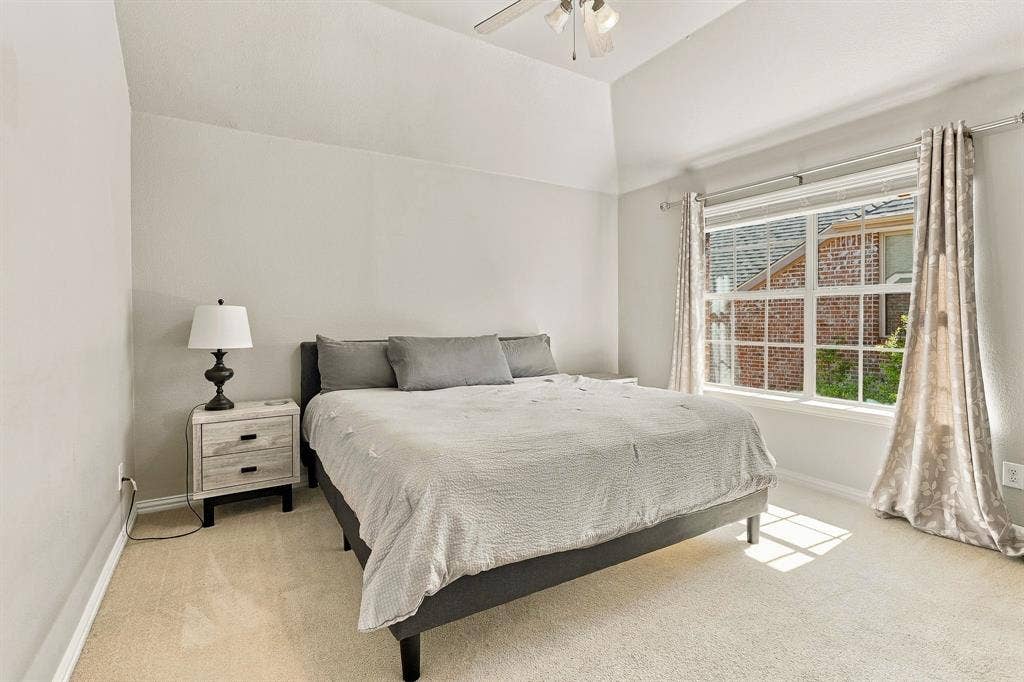 Upstairs Secondary Bedroom, Additional Room | Carpeted bedroom with a ceiling fan and a large window overlooking the surrounding trees.