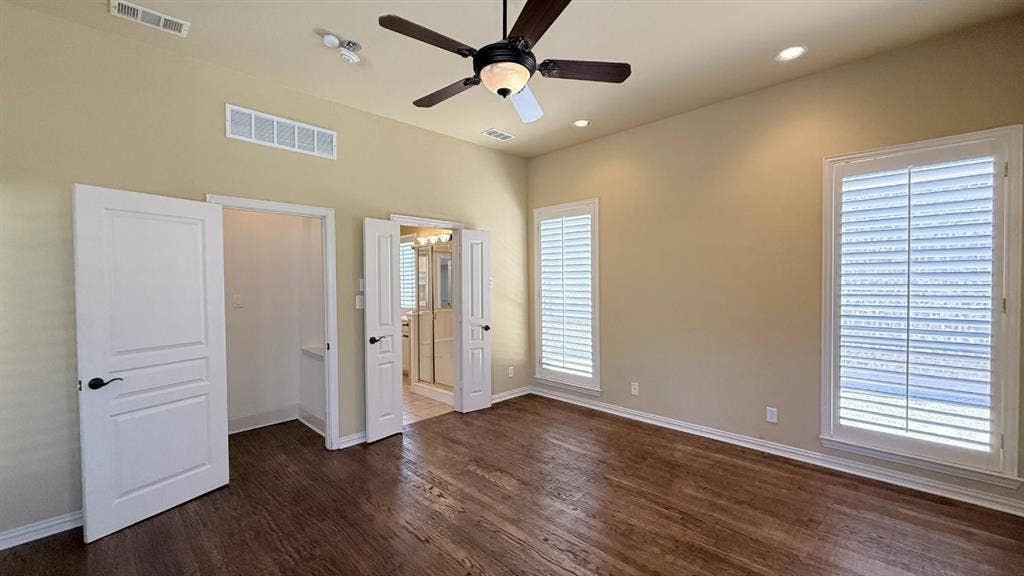 5700 Travis Drive, Frisco, TX 75034 Hardwood-finish flooring, recessed lighting, and a ceiling fan with integrated lighting
