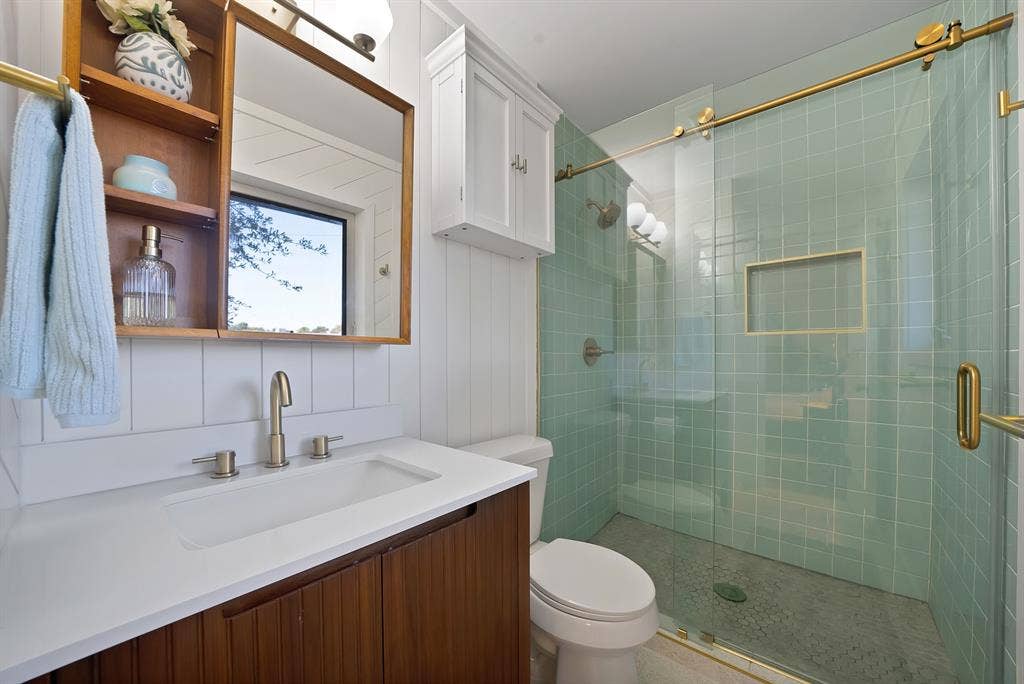 1400 Lorrie Drive, Richardson, TX 75080 Full bathroom featuring vanity and a stall shower