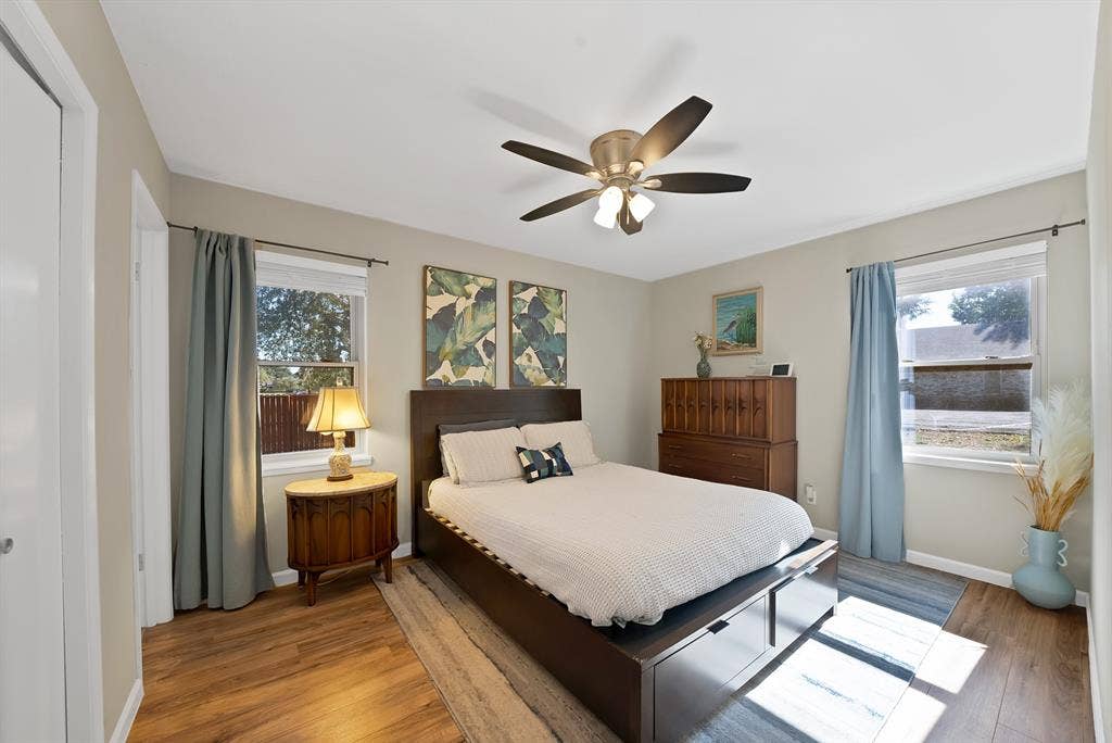 1400 Lorrie Drive, Richardson, TX 75080 Bedroom with wood finished floors and ceiling fan