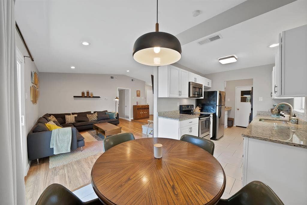 1400 Lorrie Drive, Richardson, TX 75080 Dining area with recessed lighting and light wood-style floors