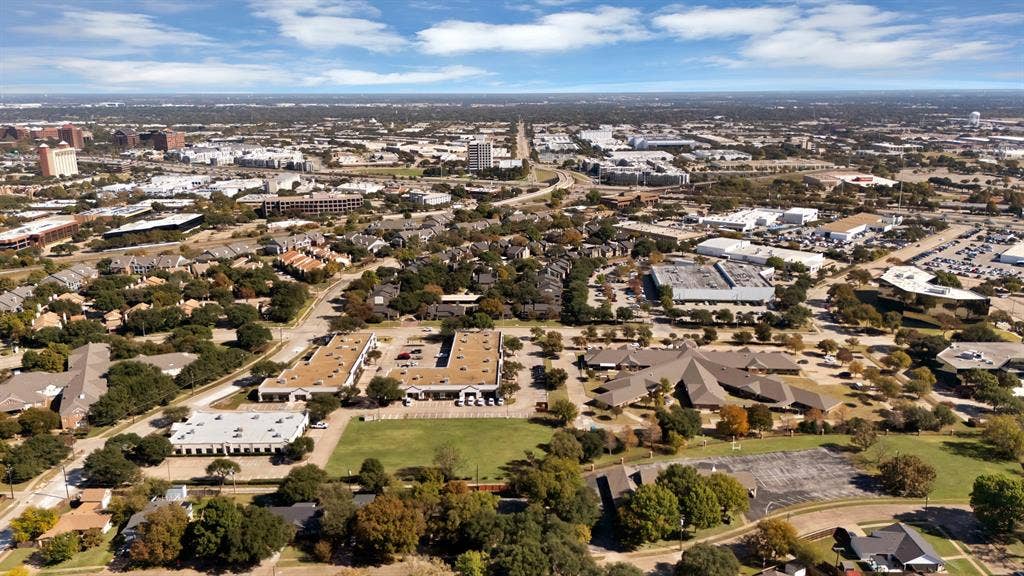 1400 Lorrie Drive, Richardson, TX 75080 Aerial view of property and surrounding area with nearby urban area