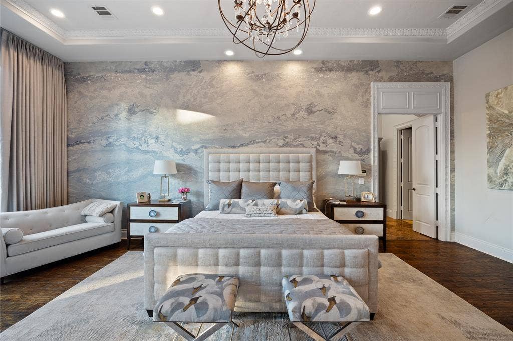 6300 Caroline Drive, Frisco, TX 75034 Crown molding, recessed lighting, wood-finish flooring, and a decorative chandelier