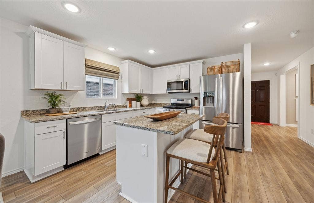 1060 Clear Dusk Lane, Forney, TX 75126 *Model Representation - Spacious kitchen with eat-in bartop island