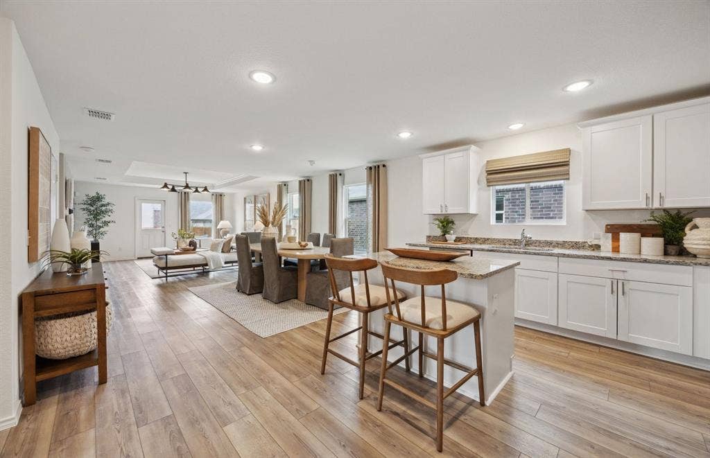 1060 Clear Dusk Lane, Forney, TX 75126 *Model Representation - Large island overlooking gathering room and dining areas