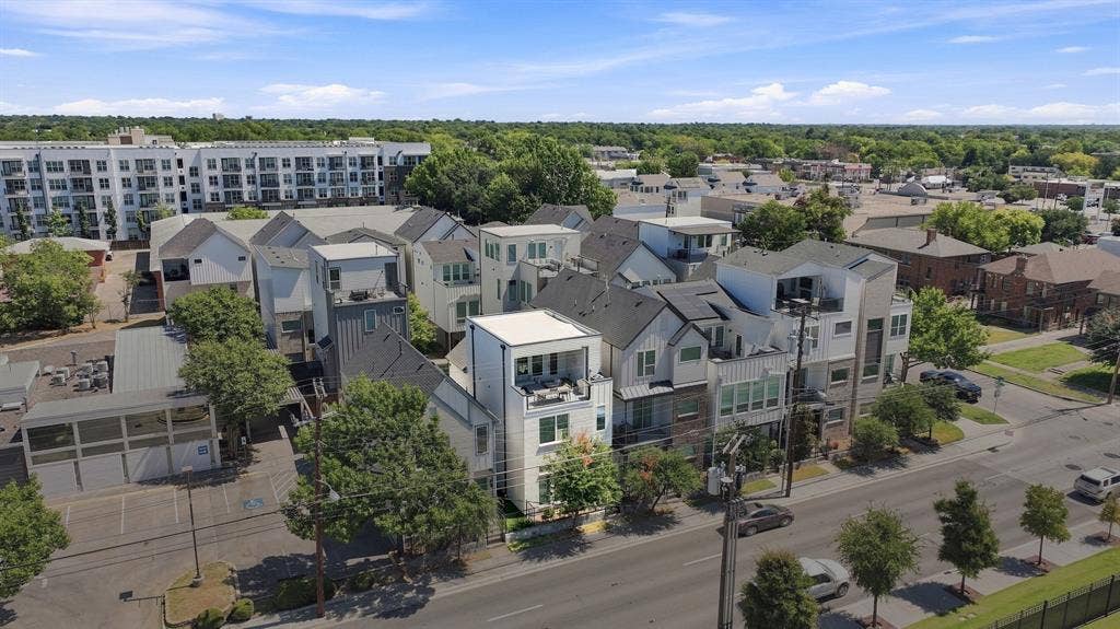 1137 Manderly Court, Dallas, TX 75204 Modern architectural style townhomes featuring multiple balconies and a multi-level design
