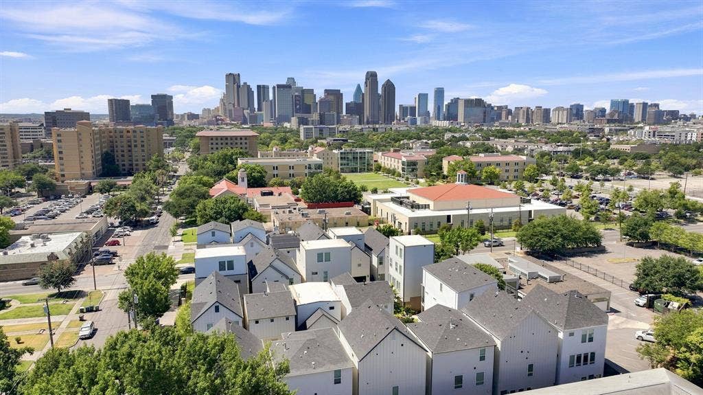 1137 Manderly Court, Dallas, TX 75204 Expansive urban landscape featuring a distant skyline of high-rise buildings