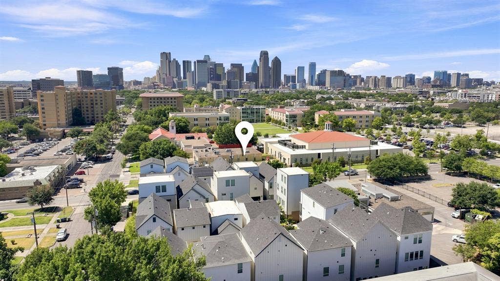 1137 Manderly Court, Dallas, TX 75204 Urban setting with a distinct city skyline in the background