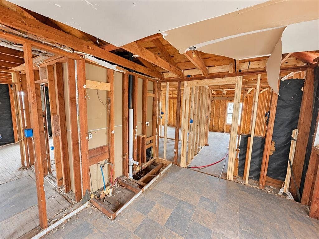 4604 Avenue H, Fort Worth, TX 76105 Exposed wooden framing, visible plumbing, and electrical rough-in