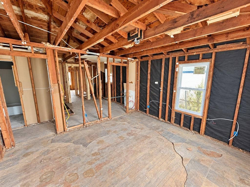 4604 Avenue H, Fort Worth, TX 76105 Exposed wood framing, visible ceiling joists, and floorboards with exposed subfloor