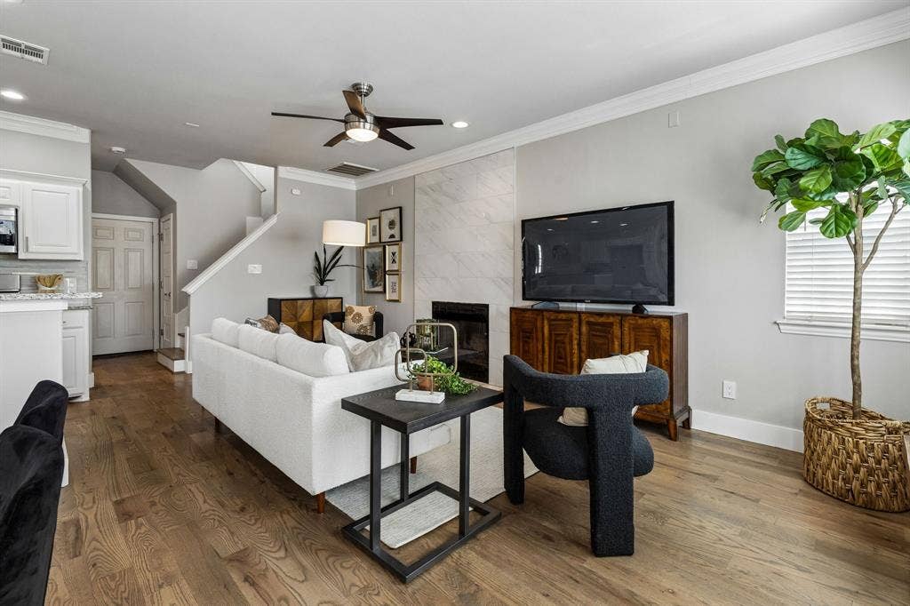 706 S Jupiter Road, #307, Allen, TX 75002 Living area with remodeled fireplace