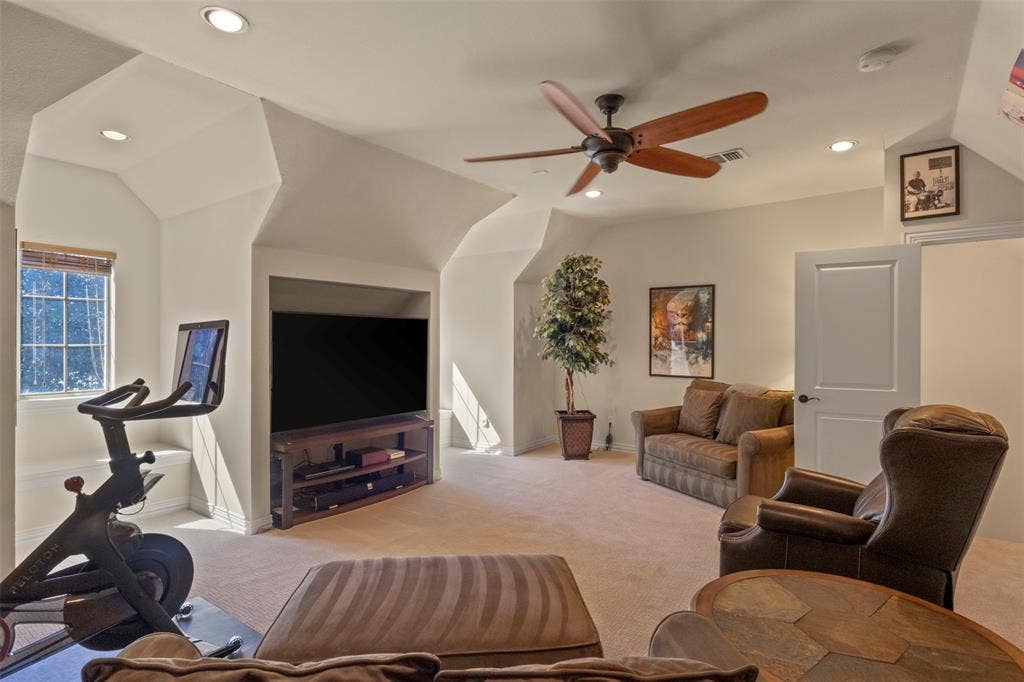 15600 Big Horn Trail, Frisco, TX 75035 Expansive property featuring a multi-gabled roofline, mature trees, a private swimming pool, and a curved driveway