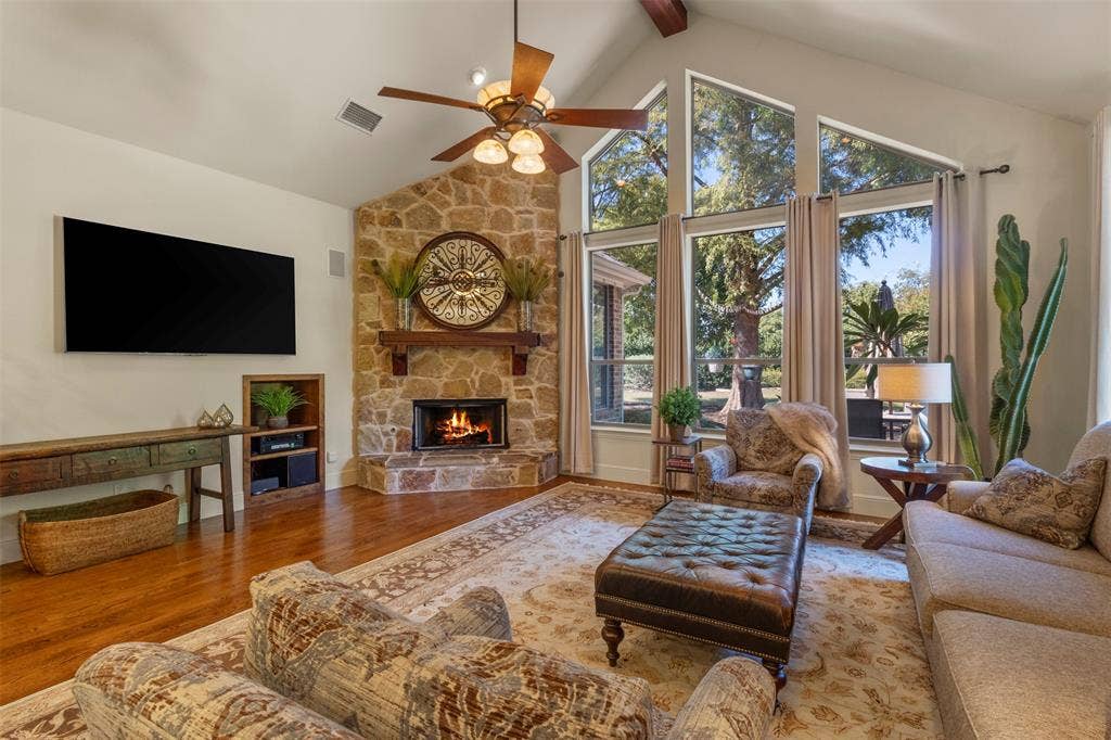 15600 Big Horn Trail, Frisco, TX 75035 Vaulted ceiling with exposed wood beams and a ceiling fan