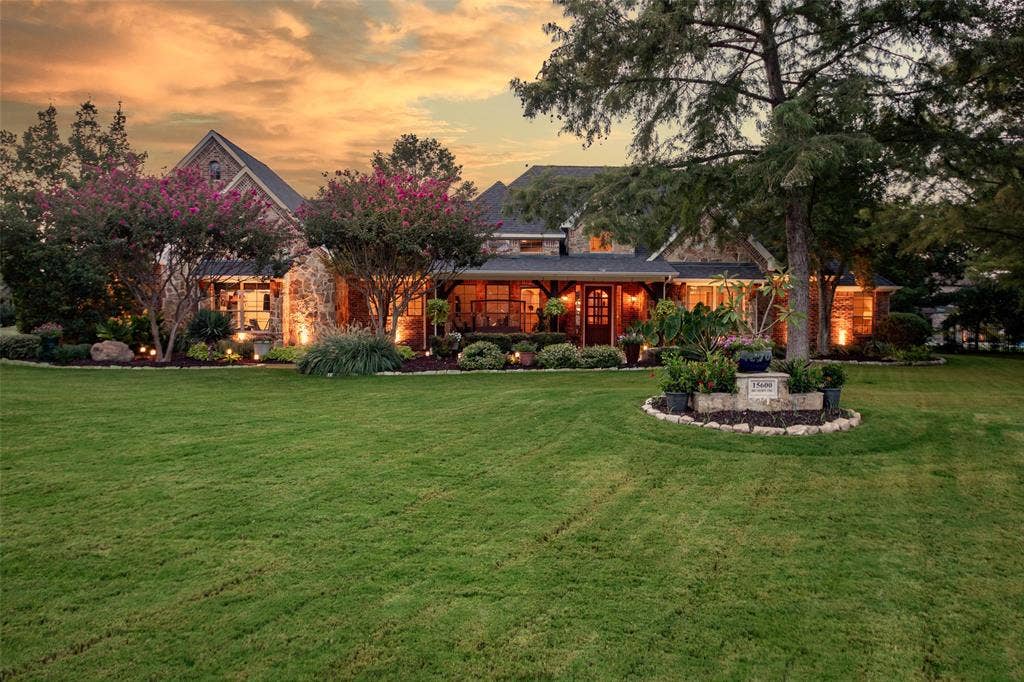 15600 Big Horn Trail, Frisco, TX 75035 Expansive front lawn with mature trees and established landscaping