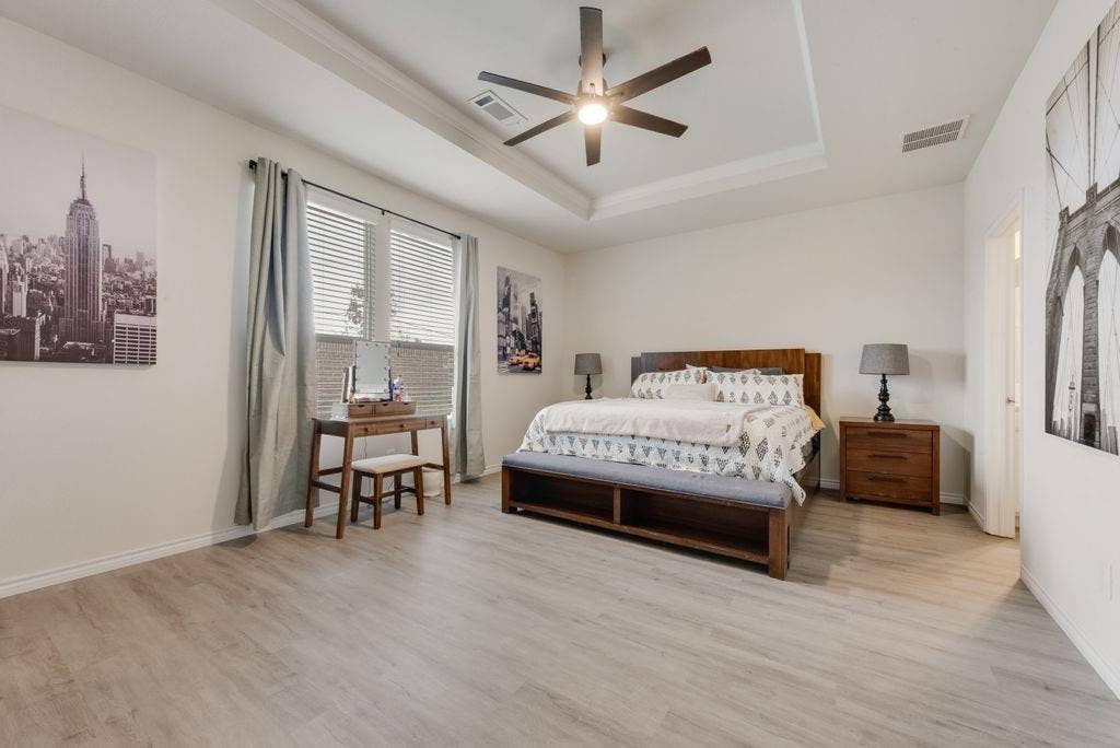 313 Citrus Drive, Fate, TX 75189 Updated flooring throughout entire house.