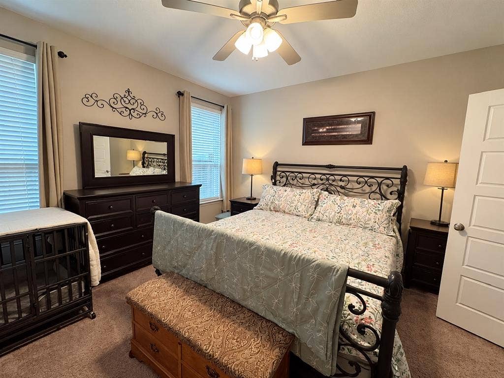 5719 Huffines Boulevard, Royse City, TX 75189 Recessed lighting, ceiling fan fixture, neutral wall paint, white paneled door, and carpeted flooring