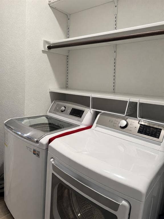 5719 Huffines Boulevard, Royse City, TX 75189 Built-in white shelving system with a hanging rod