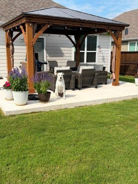 5719 Huffines Boulevard, Royse City, TX 75189 Covered outdoor patio with a concrete slab, wooden gazebo, and a manicured lawn